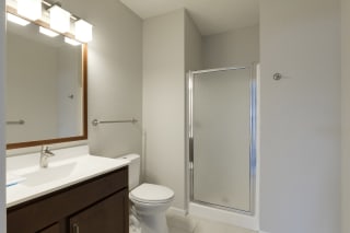 Upgraded Bath Vanity with Wood Framed Mirror Upgraded Bath Vanity with Wood Framed Mirror at Waterstone Place, Minnetonka, MN, 55305