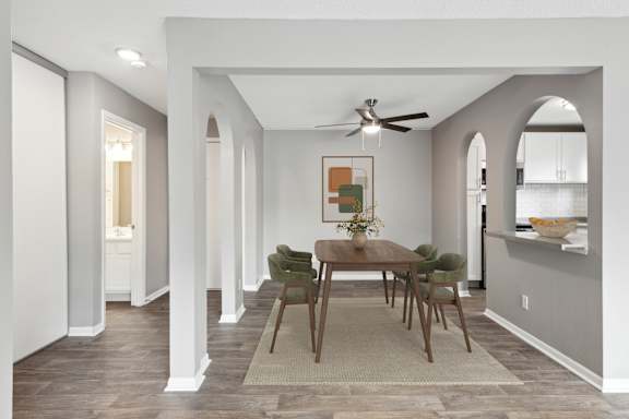 Dining room with ceiling fan at Cedarvale Highlands Apartments, Eagan, MN