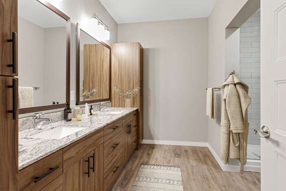Upstairs Bathroom with Large Vanity and Built-In Storage at Nuvelo at Parkside, Minnesota