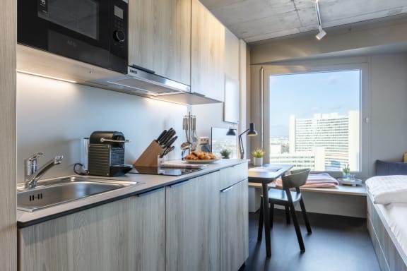 a kitchen and a dining room in a apartment
