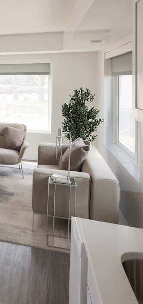 A modern living room with a wooden floor and furniture.