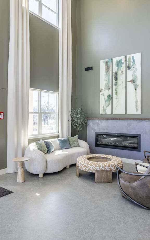 a dining room with a table and chairs and a painting on the wall at Preserve at Sycamore Creek, Missouri 65065