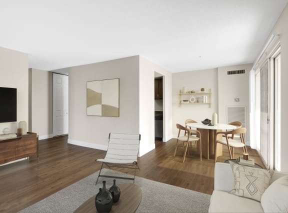 a living room and dining room with a table and chairs at Kellogg Square, St. Paul, MN, 55101