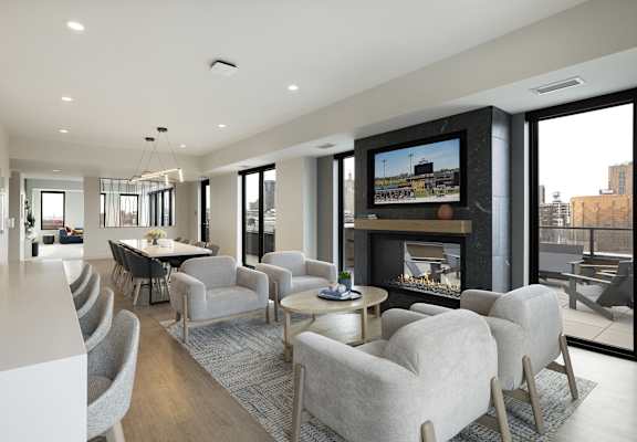 A modern living room with a fireplace and a television.