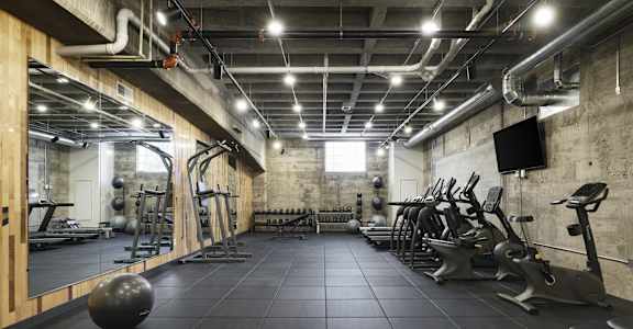 a gym with weights and other exercise equipment