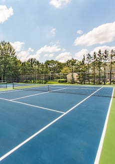 the tennis courts at the preserve at ballantyne commons at Highland Ridge Apartments, Overland Park , KS 66210