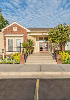 a house with a sidewalk in front of it at Highland Ridge Apartments, Overland Park , KS 66210