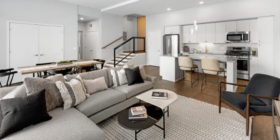 a living room with a couch and a table