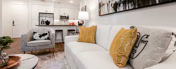 Contemporary Keene at The District Living Room with Artwork and Warm Finishes