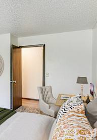 Bedroom With Closet at Pheasant Park Apartments, New Hope, MN, 55428-5401