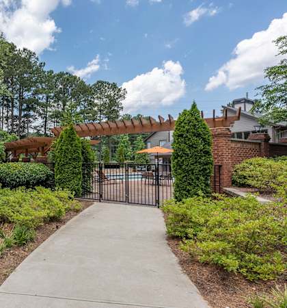 the preserve at ballantyne commons apartments walkway to pool and gated patio