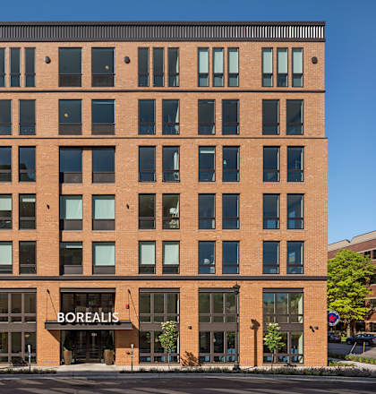 A large brick building with the word "Borealis" on the front.