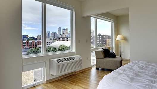 Skyline view of downtown Minneapolis from the Flat H, 1 bedroom floor plan at Coze Flats