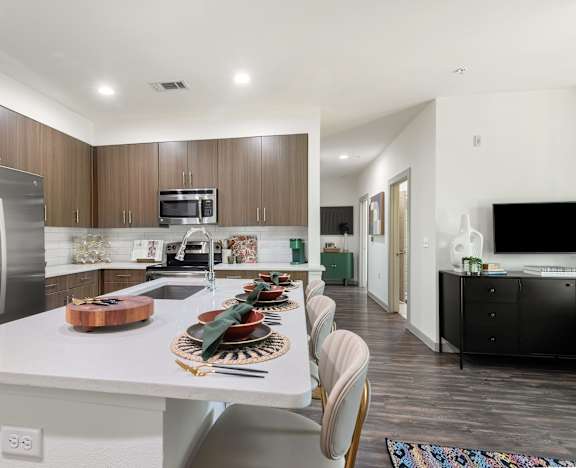 Contemporary Kitchen with Quartz Countertops and Designer Cabinetry at Lamar Union