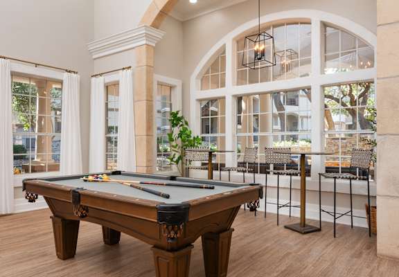 the preserve at ballantyne commons pool table and bar in the resident clubhouse  at Hayden on West Ave, San Antonio