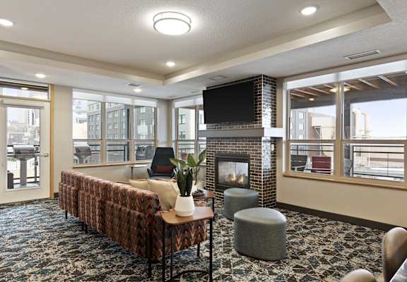 A living room with a fireplace and a couch.