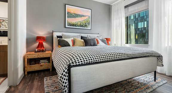 Stylish Open-Plan Living Space with Breakfast Bar and Designer Decor at Lamar Union