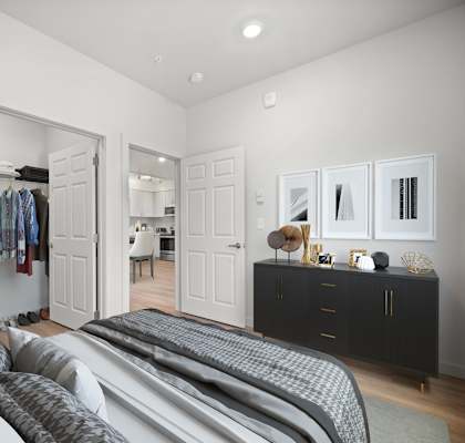 a bedroom with a bed and a closet