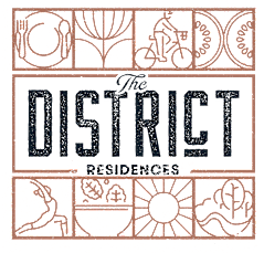 A brown square with a white circle in the middle and lines radiating outwards at The District at Deerfield Residences Apartments, Mason, OH, 45040