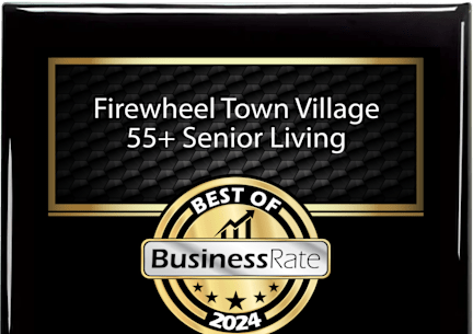 A black and gold award plaque for Firewheel Town Village 55+ Senior Living.