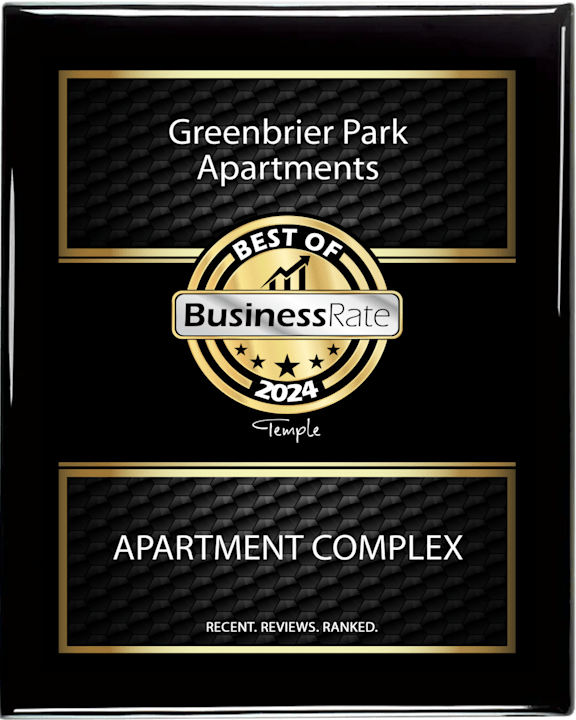 A black and gold award for Greenbrier Park Apartments from Business Rate.