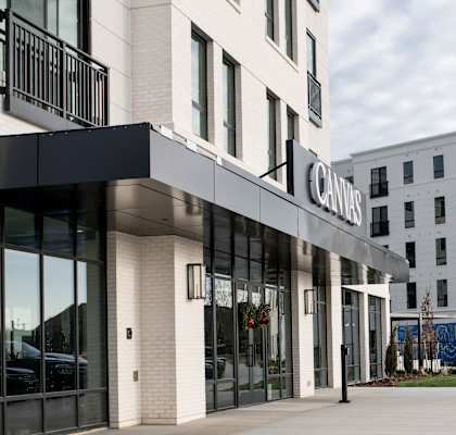 a large building with a sign on the front of it