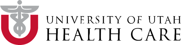 A medical symbol is superimposed on a red letter "U".