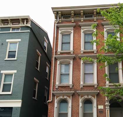 a red brick building on a city street