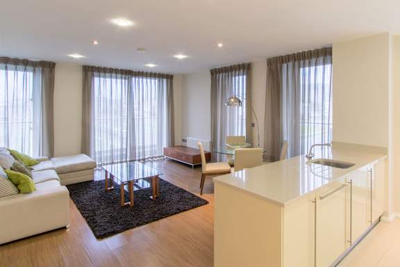 a living room with a couch and a table