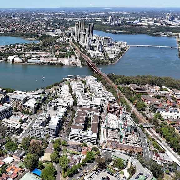 A cityscape with a river running through it.