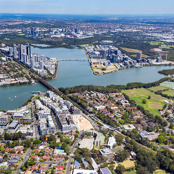 A cityscape with a river running through it.