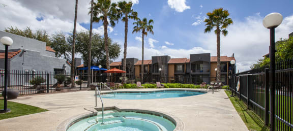 Casa Bella Apartments in Tucson, Arizona Pool with Lounge Chairs and Hot Tub