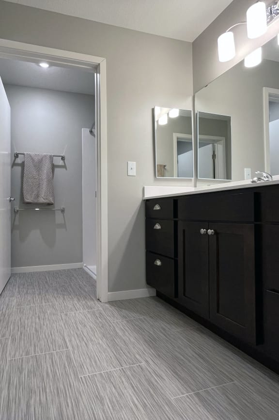 a bathroom with a toilet and a sink and a bath tub