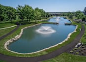 Thumbnail 5 of 53 - Lenexa KS Apartments-Waterside Residences at Quivira Apartments Neighboring Lake With Fountain And Surrounding Greenery  at Waterside Residences on Quivira, Lenexa, KS, 66215