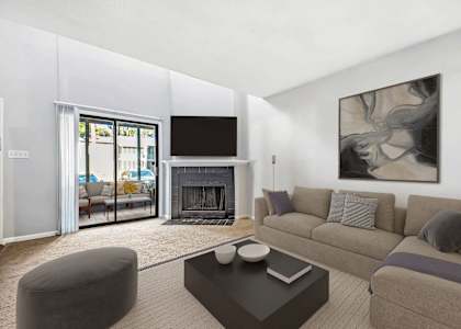 a living room with a couch and a coffee table