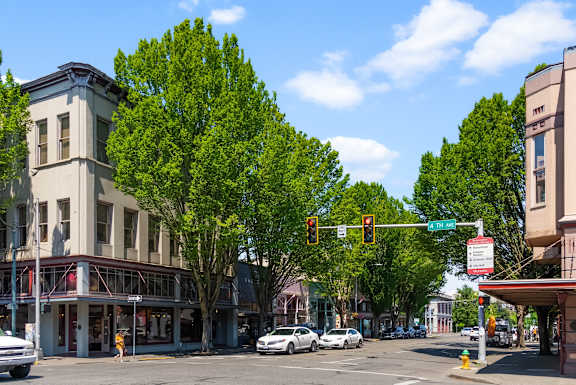 a traffic light on the corner of a city street