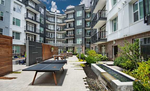 Outdoor patio with games at Glenn Perimeter, Georgia, 30328