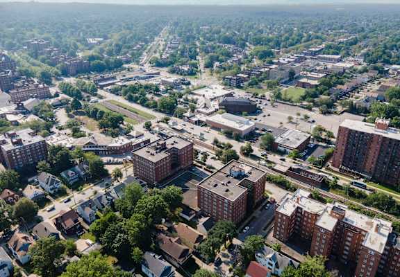 A bird's eye view of a city with buildings and trees.
