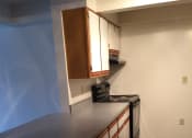 Thumbnail 9 of 21 - Image of kitchen with cabinets and appliances