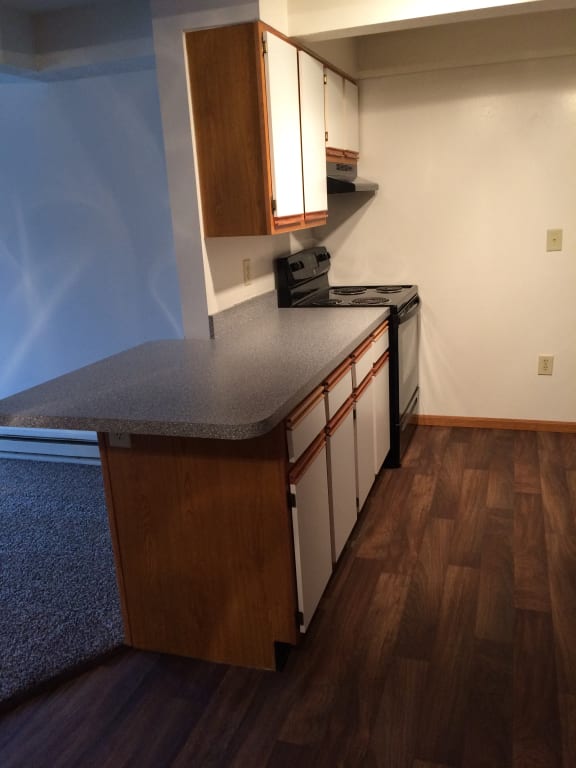 Image of kitchen with cabinets and appliances