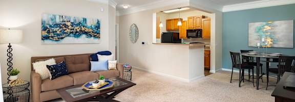 Living Room With Kitchen at Abberly Green Apartment Homes, Mooresville, North Carolina