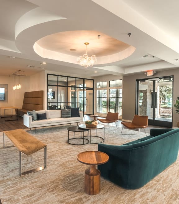 Clubroom sitting area with couches at Monterey Ranch, Texas