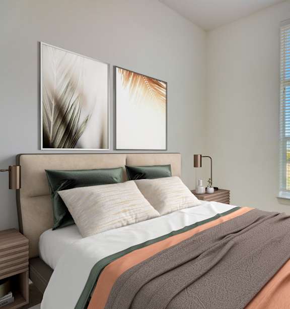 A bedroom with a large bed and a window with blinds.