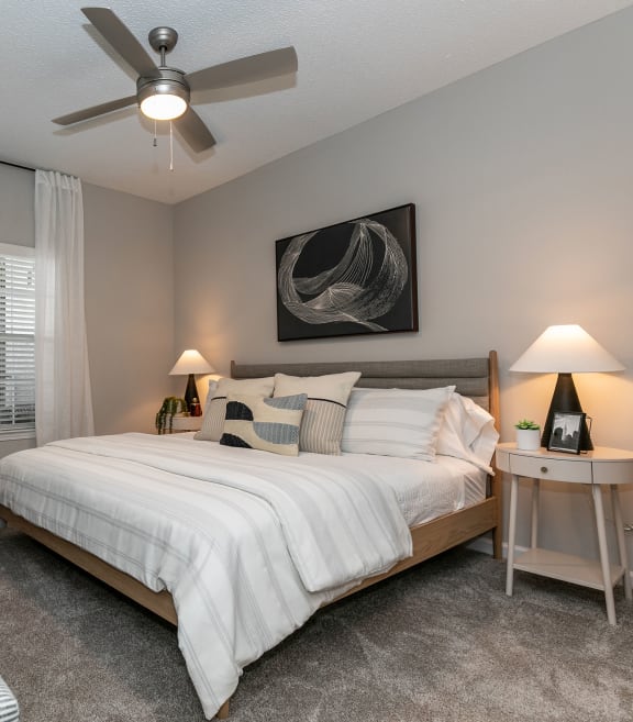 a bedroom with a bed and a ceiling fan at Willowest in Lindbergh in Georgia 30318