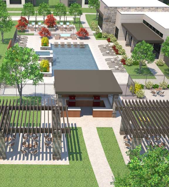A pool surrounded by trees and a building.