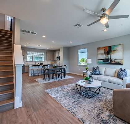Living Room With Expansive Window and dining area at Villae ATX Luxury Rental Townhomes, Manchaca, 78652