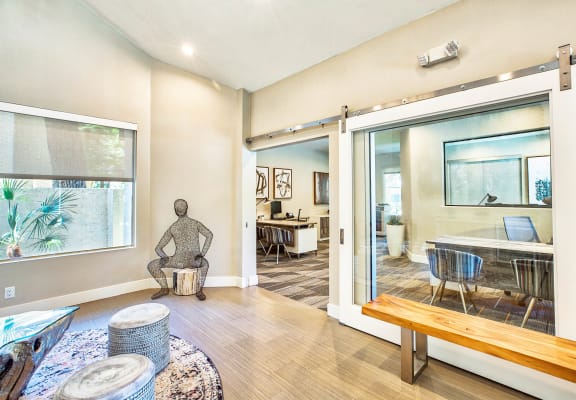 a living room with sliding glass doors to a dining room at Mountain Vista, California