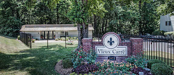 Vieux Carre property sign and fence
