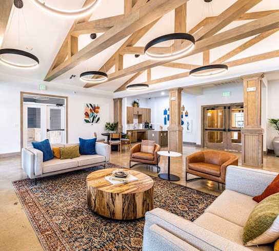 a living room with couches and chairs and a coffee table at The Parker Austin, Pflugerville, 78660