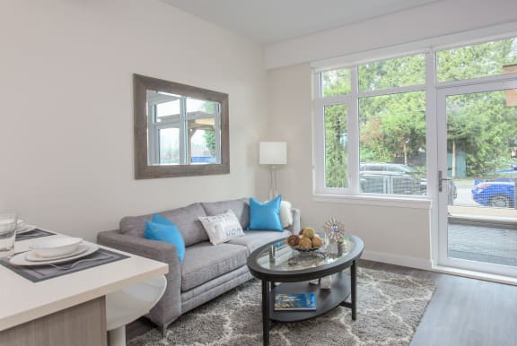 a living room with a couch and a coffee table